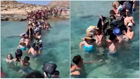 Creta, turisti costretti a scendere e risalire sulla nave immersi nell'acqua e sollevando i bagagli